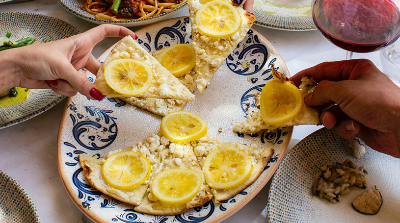 dogu-tuncer-unsplash-a-table-with-plates-of-food