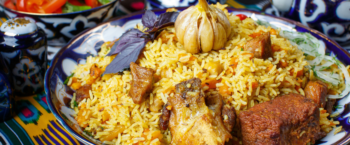 eugene-krasnaok-unsplash-a-plate-of-rice-with-meat-and-vegetables