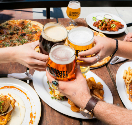 elevate-unsplash-people-toasting-with-10-barrel-beer