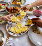 dogu-tuncer-unsplash-a-table-with-plates-of-food